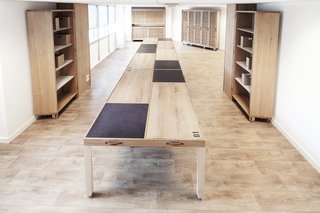 A Modular Meeting Room Features a Table with 6 Possible Layouts - Photo 1 of 6 - When desigers Lucie Hardelay & Tristan Ponsot of the French design firm Les Ateliers Tristan & Sagitta were tasked with creating furniture for a meeting room that hosts large monthly gatherings, they realized they needed to create something that would be "an important area for a short period of time," but that would still be useful when meetings are not in session.