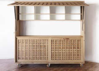 A Modular Meeting Room Features a Table with 6 Possible Layouts - Photo 4 of 6 - In addition to the six tables, the designers created additional furniture on wheels, including this "kitchen" kiosk, that help transform the room into a space for eating, a training center, or two separate meeting rooms.