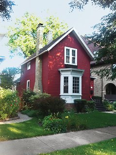 This Farmhouse-Style Home Gets a Clever and Geometric Update - Photo 2 of 5 - The existing house is a turn-of-the-century structure with a front bay window.
