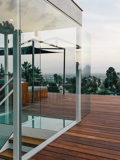 A Midcentury Home Enjoys Views from Every Angle - Photo 1 of 14 - Architect Don Dimster integrated a new roof deck and custom furnishings into Chris and Marjorie Rice’s 1960s Buff, Straub and Hensman home in Los Angeles.