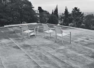A Midcentury Home Enjoys Views from Every Angle - Photo 2 of 14 - In its previous state, the roof trapped and pooled water.
