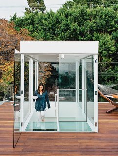 A Midcentury Home Enjoys Views from Every Angle - Photo 7 of 14 - Dimster added new, two-story-tall beams to support the weight of the glass box topping the stair. "We were missing a grand outdoor space—that’s where the roof deck comes into play," Dimster says.