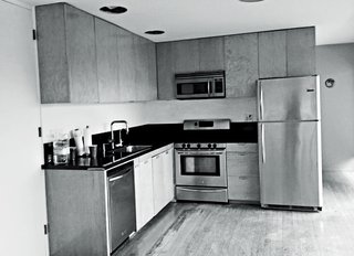 A Midcentury Home Enjoys Views from Every Angle - Photo 8 of 14 - The old kitchen became a bedroom that doubles as a study.