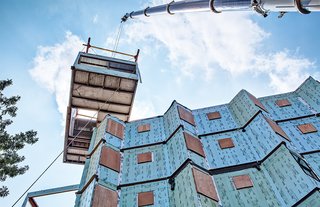 What Will It Take for Factory-Built Prefab Housing To Become the Norm? - Photo 2 of 5 - The modules are then trucked to their respective construction sites.