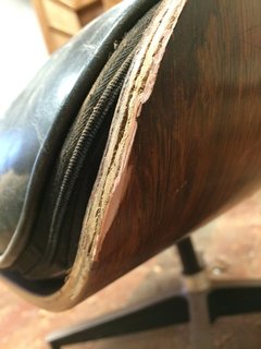 Eames Lounge Chair Porn - Photo 11 of 53 - Don’t go DIY with your repairs. If something happens to your piece, take it to a restoration professional. While fixing it yourself may save you money and time, in the long run it can cause irreparable damage to your furniture and decrease it’s value. Pictured is a failed DIY repair with an orange bonding agent on a vintage Eames lounge.