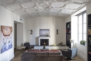 7 Historic Ceilings in Modern Homes That Have Been Beautifully Preserved - Photo 7 of 7 - The historic vaulted ceilings were carefully restored by Morris Adjmi Architects in the renovation of the ROOST Apartment Hotel in Philadelphia. They contrast with the modern herringbone wood flooring, plush furniture selection, and clean lines of the built-in shelving and fireplace.