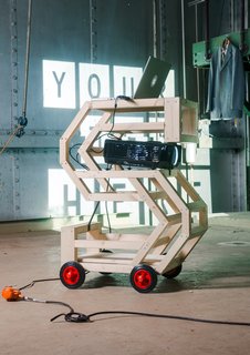 Four prominent designers with different approaches were given a letter to decorate. Marcos Zotes, an Iceland-based Spanish designer, known for doing installations and projects involving urban living, created the 'S'. He made his letter into a podium and projector stand on wheels that kept popping up as a piece of practical furniture throughout the four days of the event.