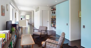 Renovating a Modern House in a Historic District - Photo 3 of 6 - Custom powder-blue sliding doors on a track from Henderson lead to the kids' rooms.