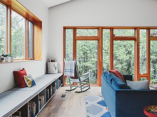 The Modern Home with Southern Charm - Photo 5 of 7 - Sohn and Carlos Anderson’s friend Forrest Kirkpatrick did all the built-ins, including the benches along the living room wall.
