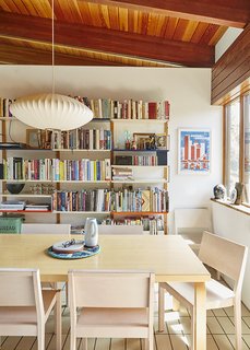 Quirky 1970s House in the English Countryside Showcases an Amazing Modern Furniture Collection - Photo 9 of 18 - The floor tiles are close matches to the originals, which had to be replaced after a pipe burst.