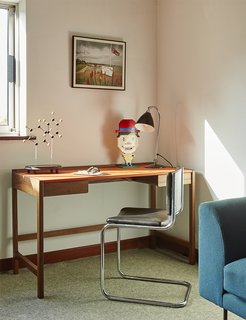 Quirky 1970s House in the English Countryside Showcases an Amazing Modern Furniture Collection - Photo 10 of 18 - A 2009 Cedric desk by Kay + Stemmer occupies the study.