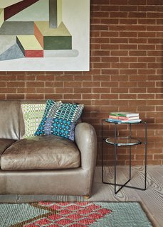 Quirky 1970s House in the English Countryside Showcases an Amazing Modern Furniture Collection - Photo 15 of 18 - The tiered side table was designed by Jasper Morrison.