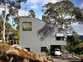 House of the Week: Party in the Hills - Photo 1 of 3 - "The steep site lends itself to the ‘upside down’ configuration," Harkness explains. "It certainly wouldn’t work as well if you could only access the house via the lower level, as this is through the bedroom zone, so we included two entrances. The upper one involves walking across a little bridge."