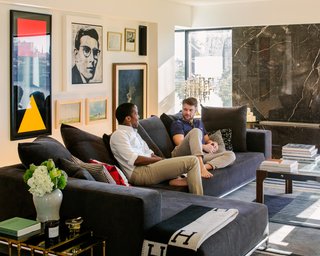 Photographer Q&A: Alexi Hobbs - Photo 7 of 8 - Byron Peart and partner Stefan Weisgerber lounge in their art-filled living room.