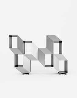 Charles Kalpakian’s Escheresque Rocky shelving lacquered in matte aluminum gray (Jekyll).