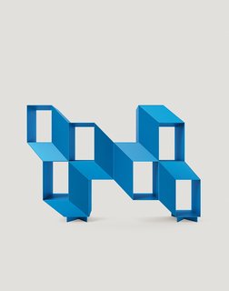 Charles Kalpakian’s Escheresque Rocky shelving lacquered in bright blue (Hyde).