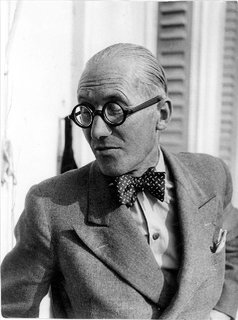 Le Corbusier: The Most Stylish Architect in History - Photo 2 of 7 - Architects weren't the only professionals to favor bow ties—surgeons, printers, and anyone else who didn't need a necktie flapping around as he worked wore them. But Corbu's bow gives his peak lapels and pocket square a bit of elan you rarely found on country doctors.