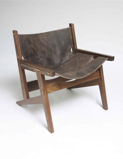 Phloem Studio's Peninsula Chair - Photo 1 of 4 - Part of the appeal of the Peninsula chair is that the sling is attached using just brass rods. Should you even want to change the sling, merely slide them out and do so.