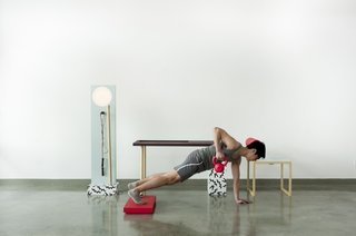 Easily remove the red laptop rester from the desk to create some height while lifting. Photo by: Mark Stokoe