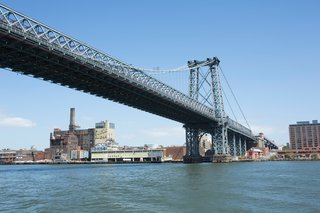 To the left of the Williamsburg Bridge, the Domino Sugar Factory awaits a Rafael Viñoly transformation.