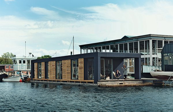 10 Modern Floating Homes That Offer an Aquatic Lifestyle - Photo 5 of 10 - Lisbeth Juul and Laust Nørgaard drew upon their years of experience living on the water to design and build an 860-square-foot floating home in Copenhagen Harbour. The home’s minimal form and furnishings reflect the residents’ desire to downsize following three years on land.