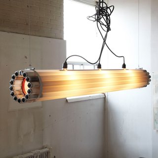 Recycled Tube Light by Castor - Photo 2 of 3 - The circularly arranged fluorescent bulbs have been reclaimed from architecturally significant buildings in Canada—like the Mies van der Rohe’s TD Tower, Toronto’s Old City Hall and the University of Toronto. Photo courtesy of Matter.