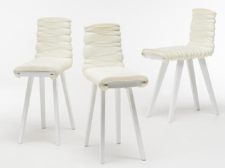 Industrial Designer Ditte Hammerstrøm - Photo 1 of 7 - Bistro Light<br><br>Upholstered chair with slightly distorted proportions, which enable new ways of using the chair. Limited edition. Manufactured by Thorsen Møbler.