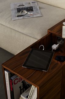 The concealed charging station slides out easily. Photo provided by Cassina.