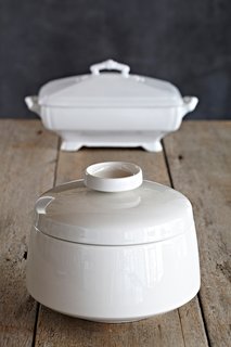 Q&A with Johanna Lowe of Martyn George - Photo 7 of 10 - "Since the late 1600s, the tureen has held an important place on the table. To quote Alice in Wonderland, 'Beautiful soup, so rich, and green/Waiting in a hot tureen.' A century apart, these two white tureens, one in the Eva Zeisal style and the other an English classic from the 19th century, are ready set to serve green beans, pilaf, or a massive amount of candy."