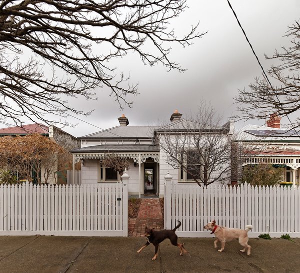 The old house had suffered several lean-to additions over the years that darkened the interior; these were removed to let in more light. Altogether, the architects retained 818 square feet of the original house and added on another 1,055 square feet, bringing the home’s total imprint to 1,873 square feet. Photo 2 of M House modern home
