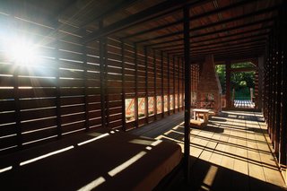 Architect Marco Casagrande designed the Chen House to make use of the nearby Datun River’s breeze. Raising the house on stilts reduces the building’s impact on the earth while preserving the home from flood waters that run underneath post-storm. Sanjhih, Taipei, Taiwan. Photo by Lukas Casagrande.