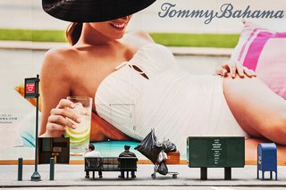 Photography Focus: Natan Dvir - Photo 1 of 8 - New York City ad and people resting on a bench in Natan Dvir's photography series Coming Soon.