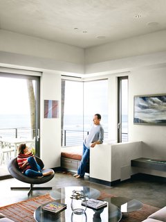 Bryan and Robin relax in a corner of the living room; the custom rug is from the Rug Affair.<br><br>To learn more about the Cranston Residence project and its players, please visit www.3palmsproject.com