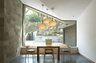 Dwell Los Angeles Home Tours Day #2 Preview: East Side and Downtown - Photo 2 of 10 - The dining area of the Kim Residence is encased in glass walls and doors, lending a sense of dining al fresco.