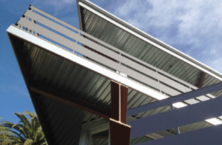 Dwell Los Angeles Home Tours Day #2 Preview: East Side and Downtown - Photo 3 of 10 - Tattuplex in Silver Lake is a custom Ecosteel prefab with geometric overlapping decks, as seen from below.