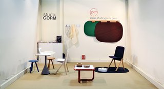 6 Noteworthy Designs from Salone Satellite 2013 - Photo 1 of 4 - Studio GormMinimalist plastic-and-wood Judd coffee table and Scene carpet, whose abstract shapes recall American highway landscapes seen from a car window.