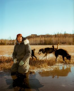Martin and his happy dogs down by the frozen lake.