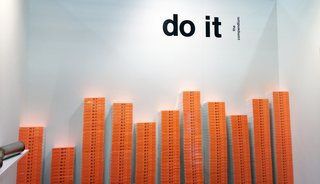 Making a splashy entrance at this year’s NADA Art Fair, do it’s booth created a wall-to-wall forest of orange tomes and installations for visitors to peak at.
