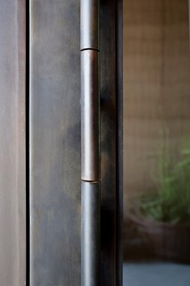 American Made Design: Dust - Photo 2 of 4 - Dust designed this door handle with a mechanism similar to that of unlocking a vault—it opens with ease even though the door is heavy.
