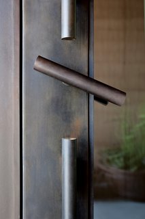 American Made Design: Dust - Photo 3 of 4 - Local fabricator Kent Willert forged the steel for the door handle.