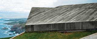 "In this house, the roof is the only facade—the rest is dissolved beneath it." —Architect Aljoša Dekleva