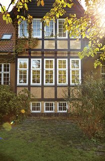 Original windows with weatherstripping, when well-maintained, can often be as energy-efficient as new double-glazed windows.