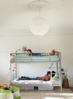 A Cramped Attic Became a Sunny Dining Room in this Renovation of a Copenhagen Tudor - Photo 12 of 12 - The boys’ bunk beds are by Ikea.