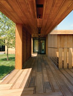 Contractor Keith Romeo worked with Bates Masi on the varied mahogany planks used for the exterior decking, which are finished simply with wood toner by Cabot.