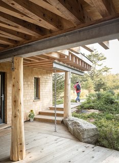 25 Homes With Exposed Beams: Rustic to Modern - Photo 21 of 25 - Angled beams are a fixture of the structure, both inside and out. The beams "are an expression of the design, so they’re reinforcing view lines," Winkelman says, "but they’re also weaving together the different axes of the site."