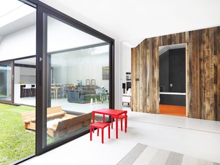 Central to the design of the home from day one was the "Dunny Block", an Australian toilet historically found outside the home. The Dunny Block from the yard of the original home was incorporated into the interior program of the new home, now housing the new main floor bathroom. The block is clad in recycled messmate timber, and is a bold focal point of the living space.