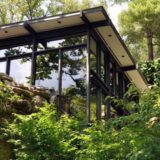 While Wright designed the interior, architect David L. Leavitt is generally credited with the exterior. Manitoga postdates Frank Lloyd Wright's Fallingwater (built in 1936-39), and while the there is some resemblance, the latter was not a direct inspiration. The two Wrights were not related but were acquaintented with each other.
