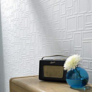 WALLPAPER THAT FIXES WALLS<br><br>A new line of wallpapers from Graham and Brown allows you cover up that disaster you call a wall. Cinderblocks, paneling, really bad cracks? These wallpapers will smooth right over them.