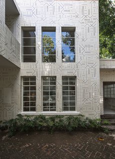 10,000 Bones Cover the Walls of this Mexico Restaurant - Photo 2 of 9 - Located in a former artist’s studio in a hip area of Jalisco, the restaurant is adorned with José Noé Suro custom ceramic tiles, inspired by the patterns made by local weavers. The pattern also reflects the kitchen’s ad-hoc, irreverent style.