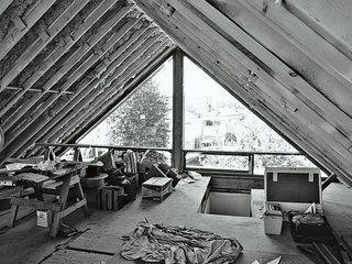 "We tried to envision just two floors, but once summer arrived we decided that we were going to tear the roof off and put on that triangle with windows."